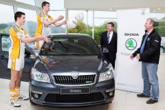 Bandon players Patrick O'Brien and Mark Sugrue test Bandon Intermediate coach and former Cork All Star Teddy McCarthy's catching skills watch by Justin Galvin [MD Finbarr Galvins].